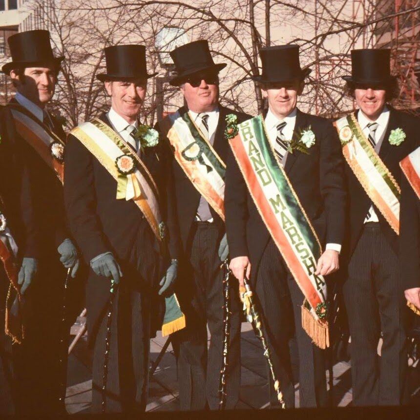 Jim Dinnan in center standing next to 1976 Grand Marshal John O'Donovan