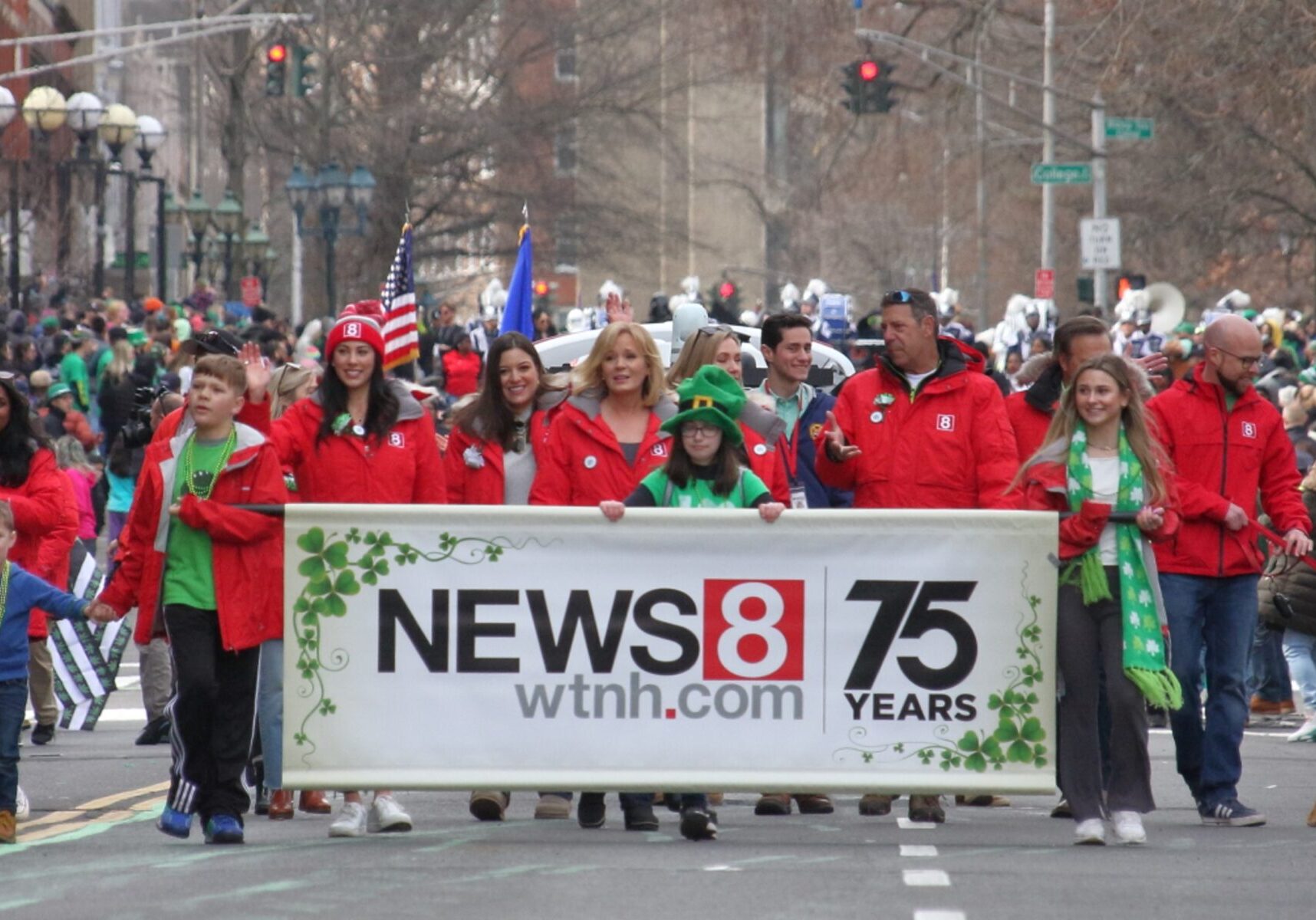 WTNHMarchingWithBanner75yrs